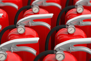 Blog header images showing the tops of multiple different fire extinguishers
